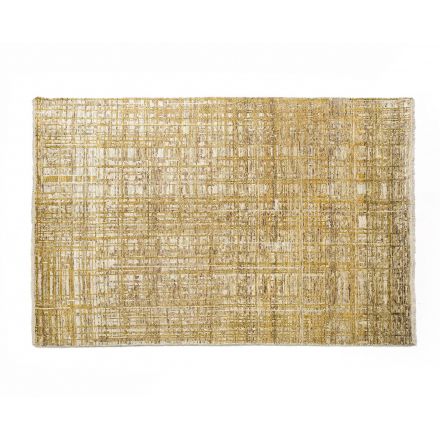 Alfombra Blossom anudada a mano con un 80% de lana de Kuatro Carpets en color gold