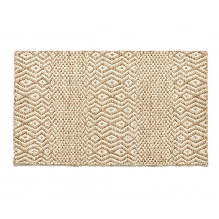 Field, una alfombra tejida a mano con un patrón que se hace grande y pequeño de Kuatro Carpets en color beige
